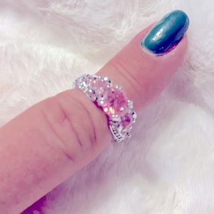 Silver and pink ring